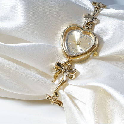 Retro Heart - shaped Bracelet Watch With A Golden Bow And Flower Design A Stylish Womens Timepiece - Oopsdadforgot.com