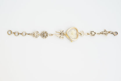 Retro Heart - shaped Bracelet Watch With A Golden Bow And Flower Design A Stylish Womens Timepiece - Oopsdadforgot.com