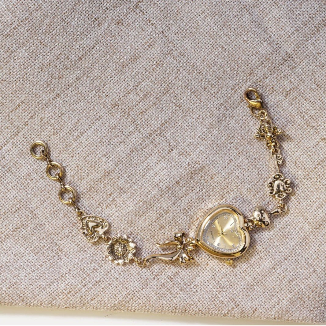 Retro Heart - shaped Bracelet Watch With A Golden Bow And Flower Design A Stylish Womens Timepiece - Oopsdadforgot.com